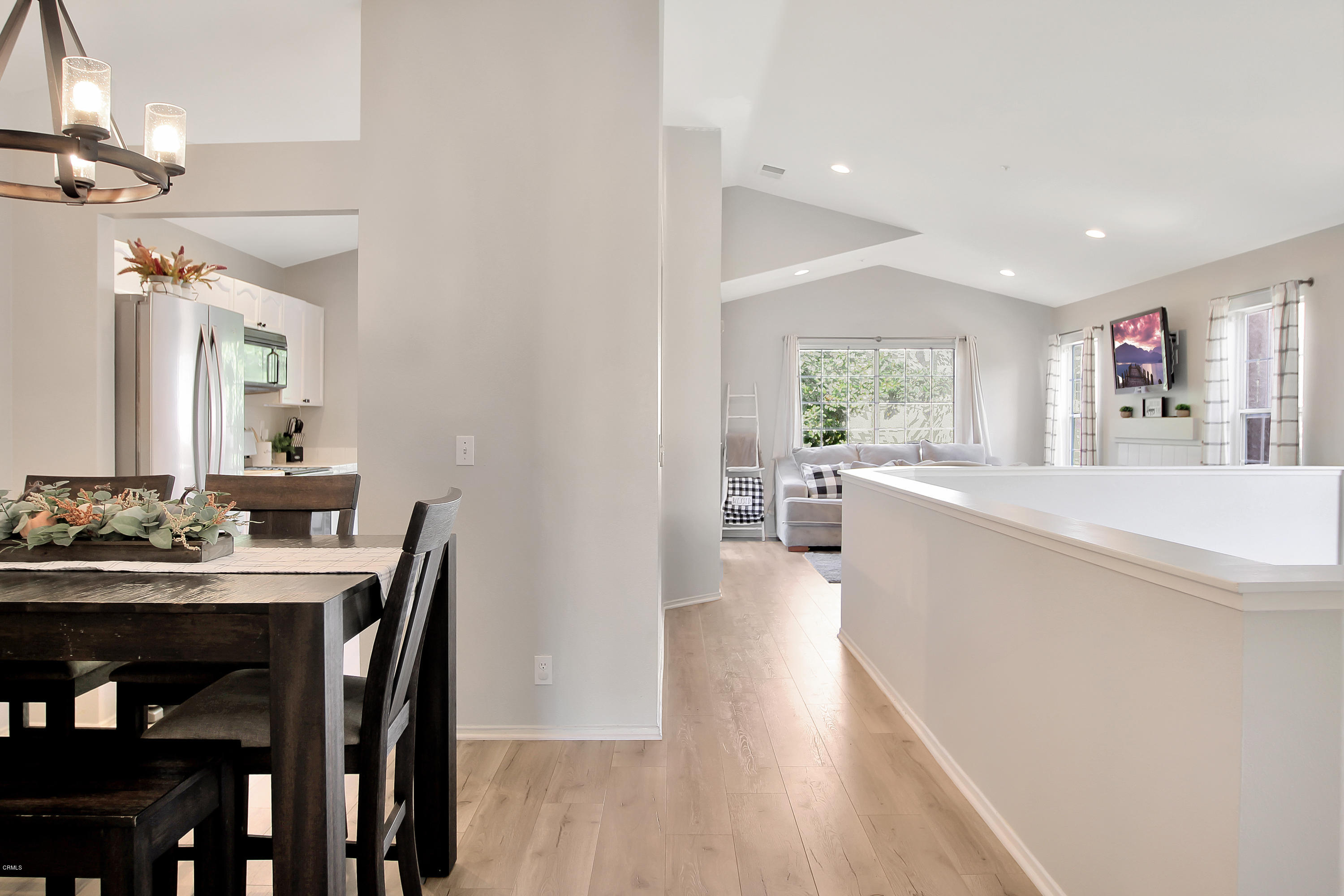 1303 Lost Point Lane Oxnard, CA 93030 - Photo 11 of 28 a kitchen with a table and chairs