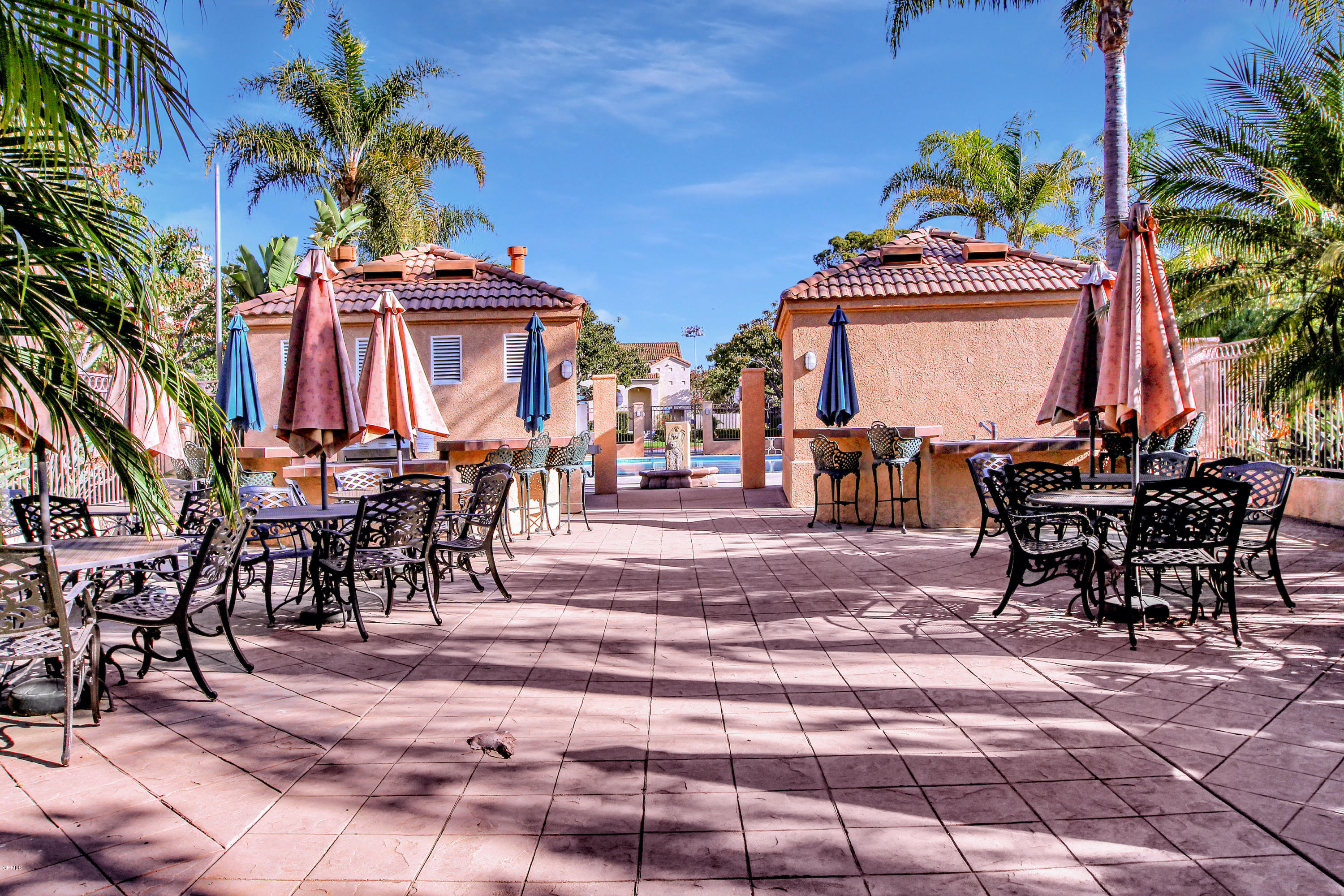 1303 Lost Point Lane Oxnard, CA 93030 - Photo 26 of 28 a view of a chairs and table in a patio