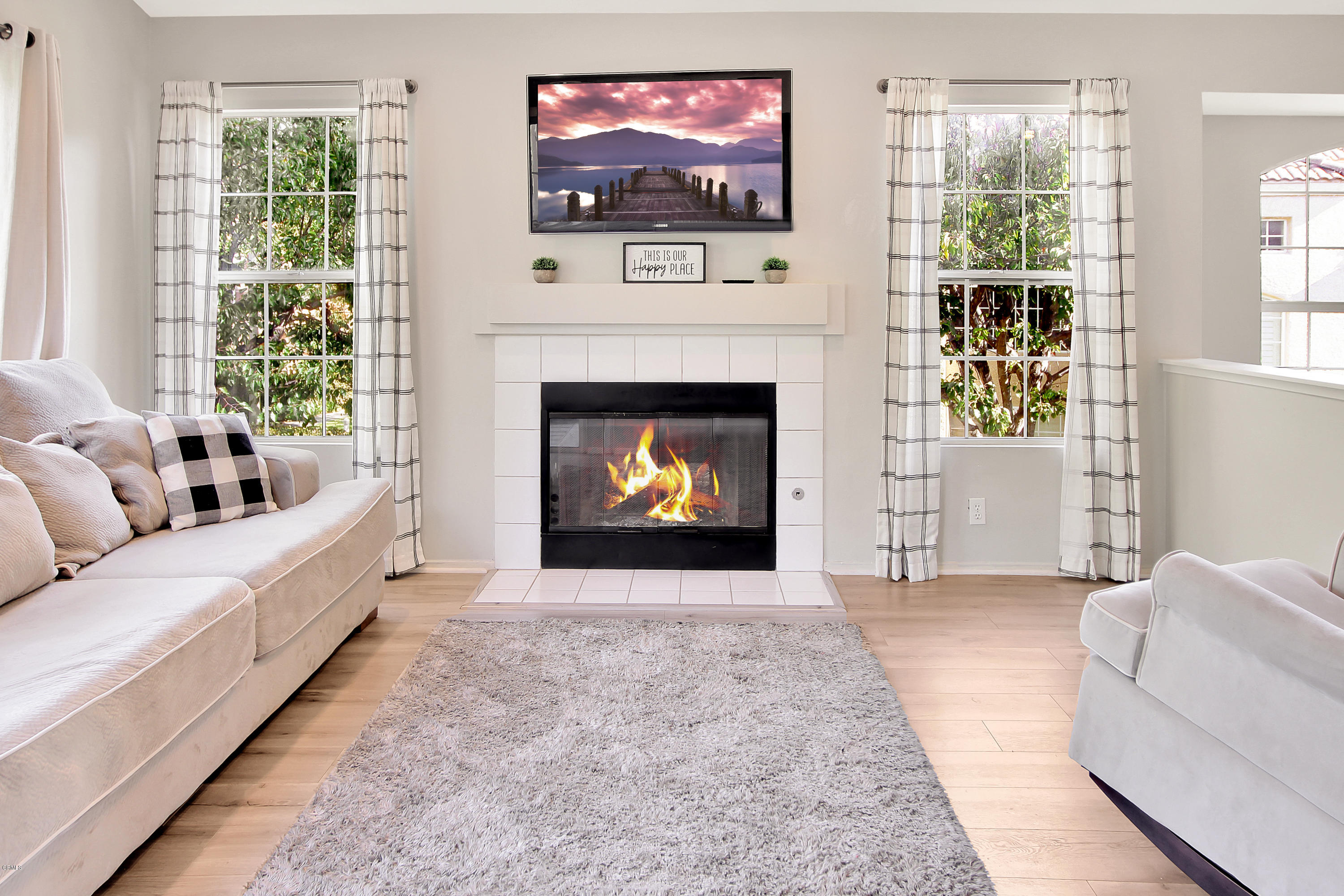 1303 Lost Point Lane Oxnard, CA 93030 - Photo 9 of 28 a living room with furniture and a fireplace