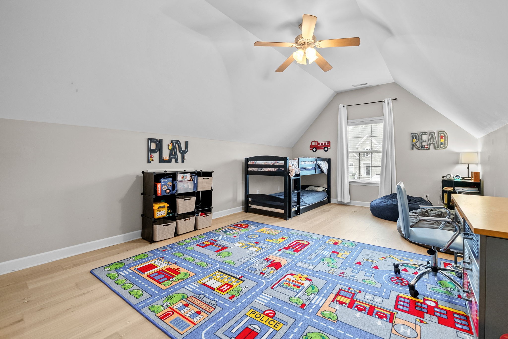 1161 Cynthia Lane Spring Hill, TN 37174 - Photo 29 of 42 a bedroom with furniture and a book shelf