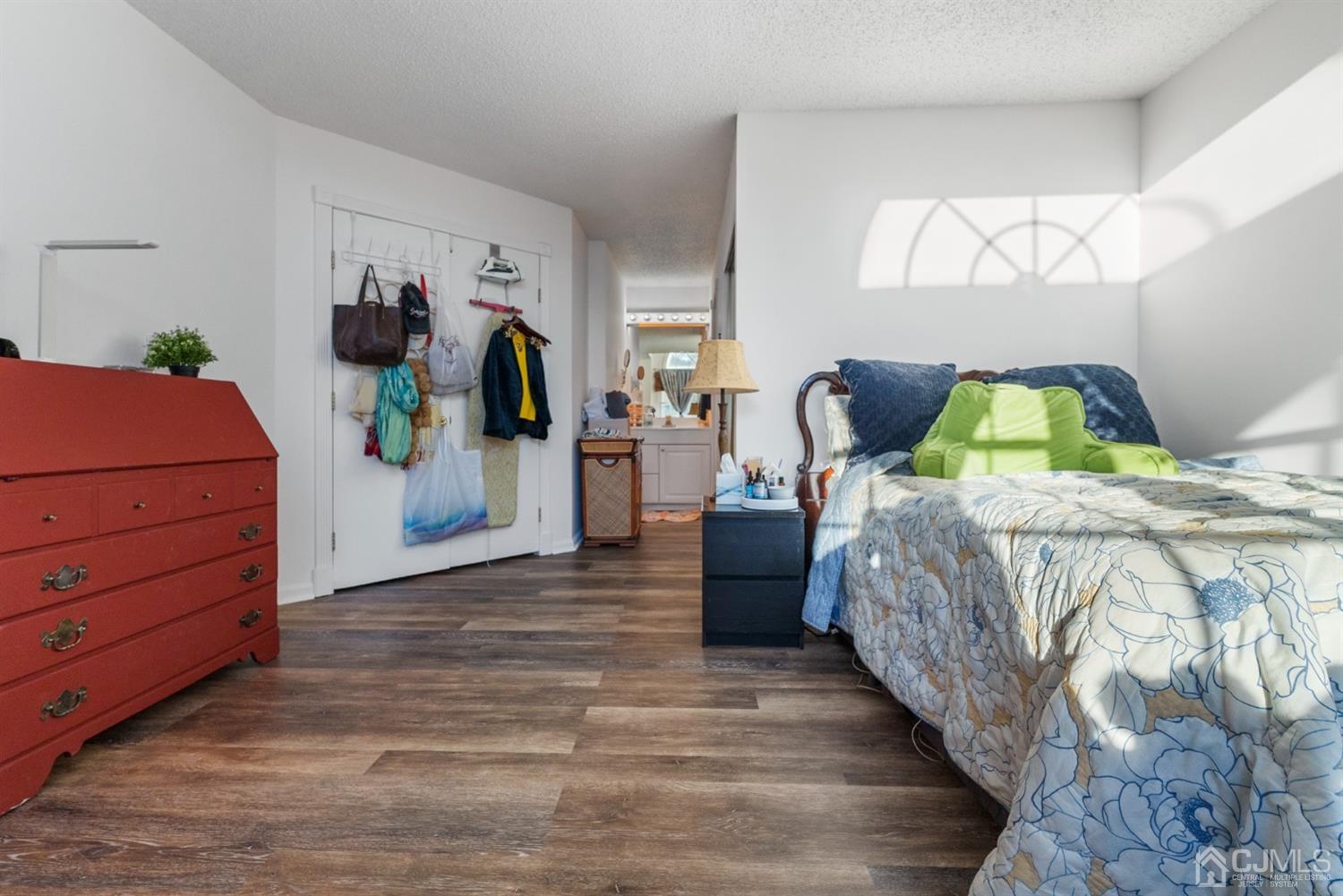 134 Edpas Road New Brunswick, NJ 08901 - Photo 12 of 16 a bed room with a bed and a couch