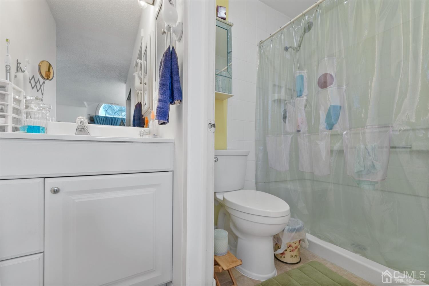 134 Edpas Road New Brunswick, NJ 08901 - Photo 13 of 16 a bathroom with a toilet and a shower