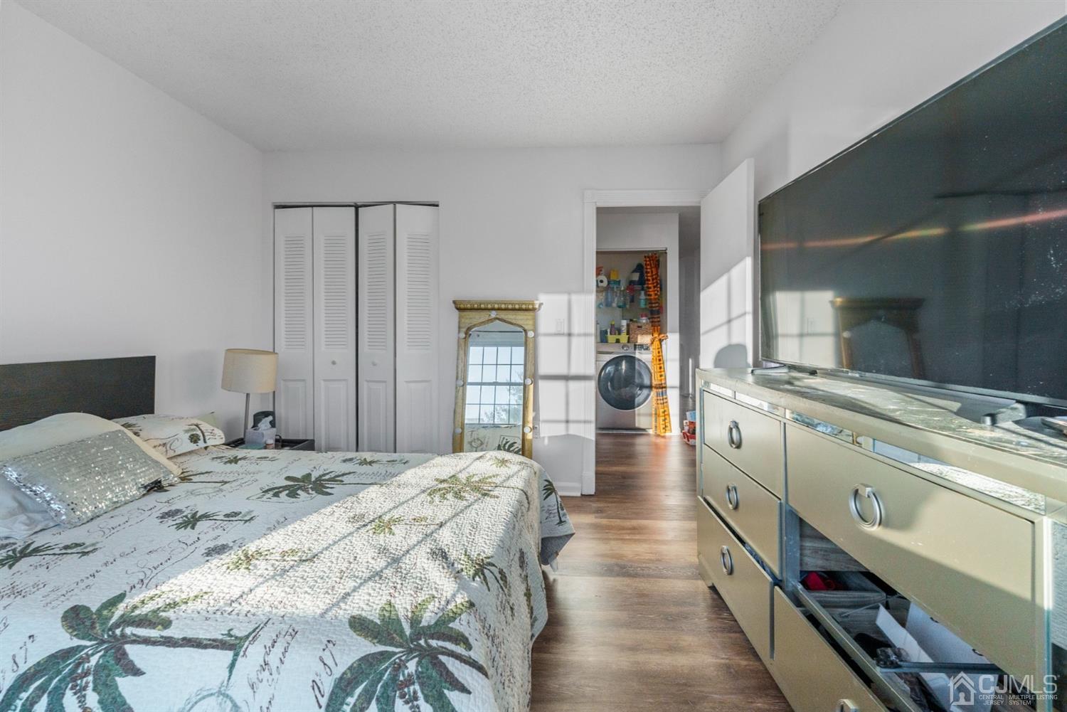 134 Edpas Road New Brunswick, NJ 08901 - Photo 15 of 16 a large white bed in a white room