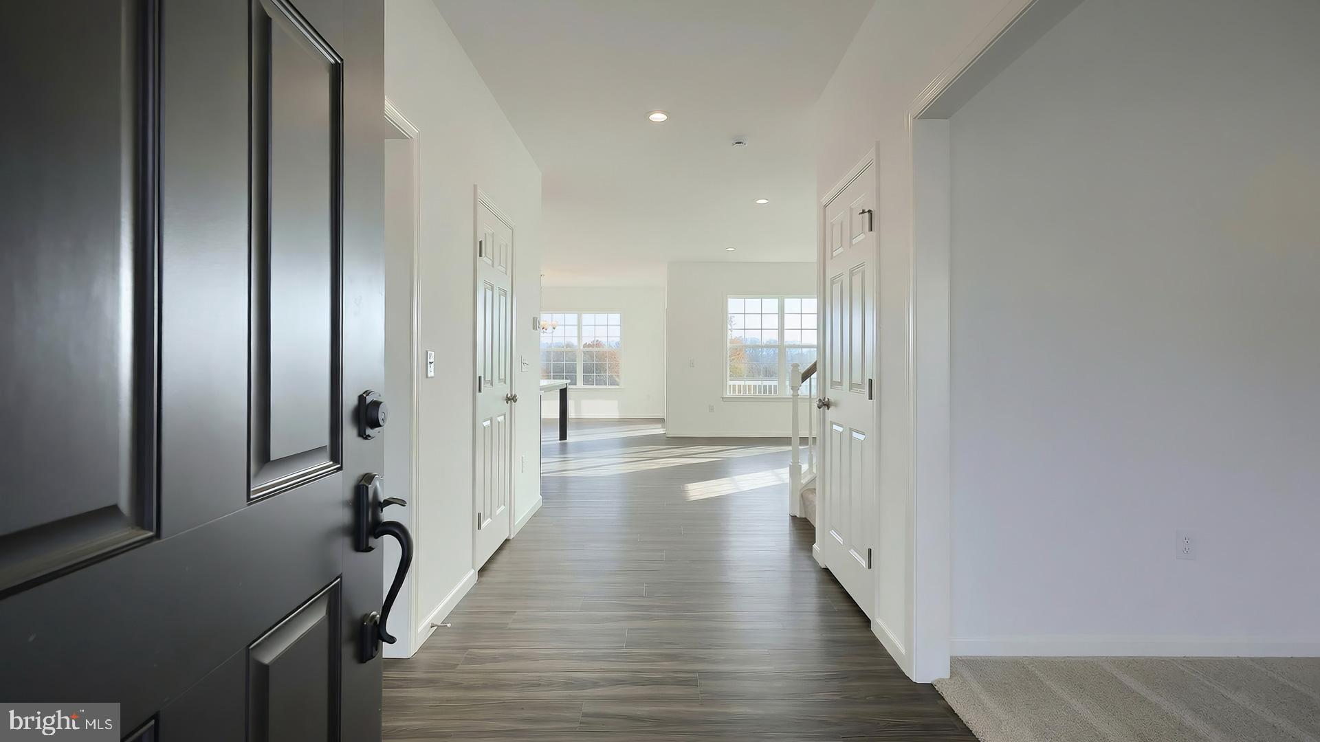 217 Copper Ridge Drive Newmanstown, PA 17073 - Photo 16 of 30 a view of a hallway with wooden floor and closet
