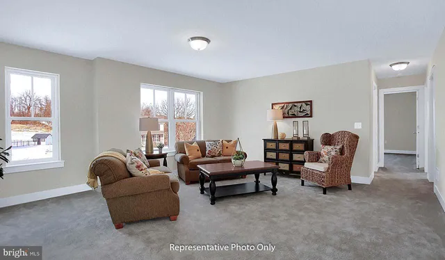 a bathroom with a granite countertop sink mirror and toilet