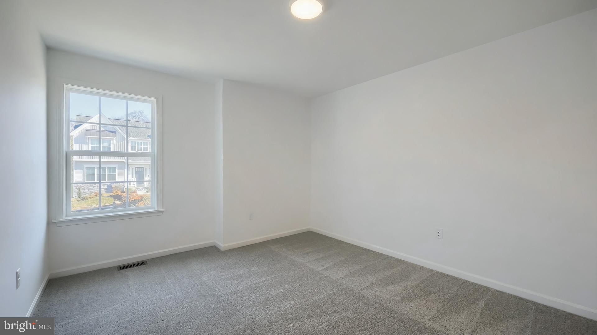 217 Copper Ridge Drive Newmanstown, PA 17073 - Photo 27 of 30 an empty room with windows