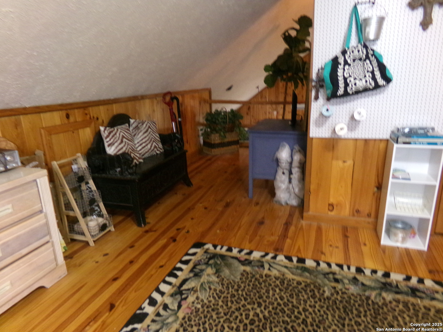 902 Mariposa Concan, TX 78838 - Photo 10 of 10 a view of a bedroom with wooden floor
