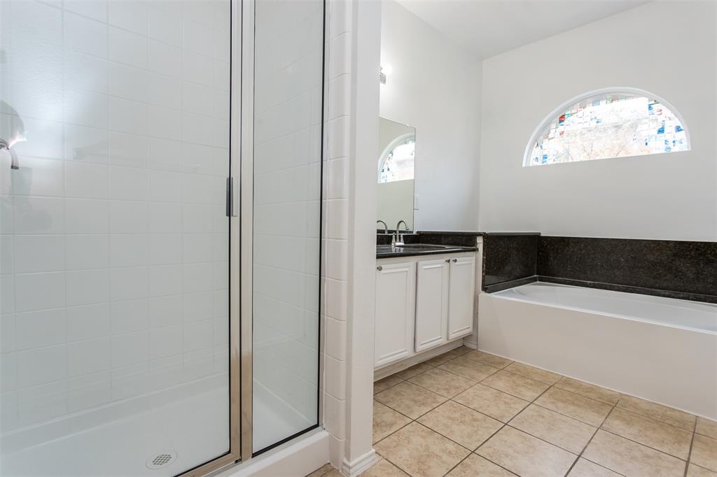738 Opal Lane Mesquite, TX 75149 - Photo 20 of 31 Full bath with vanity, light tile patterned floors, a bath, and a shower stall