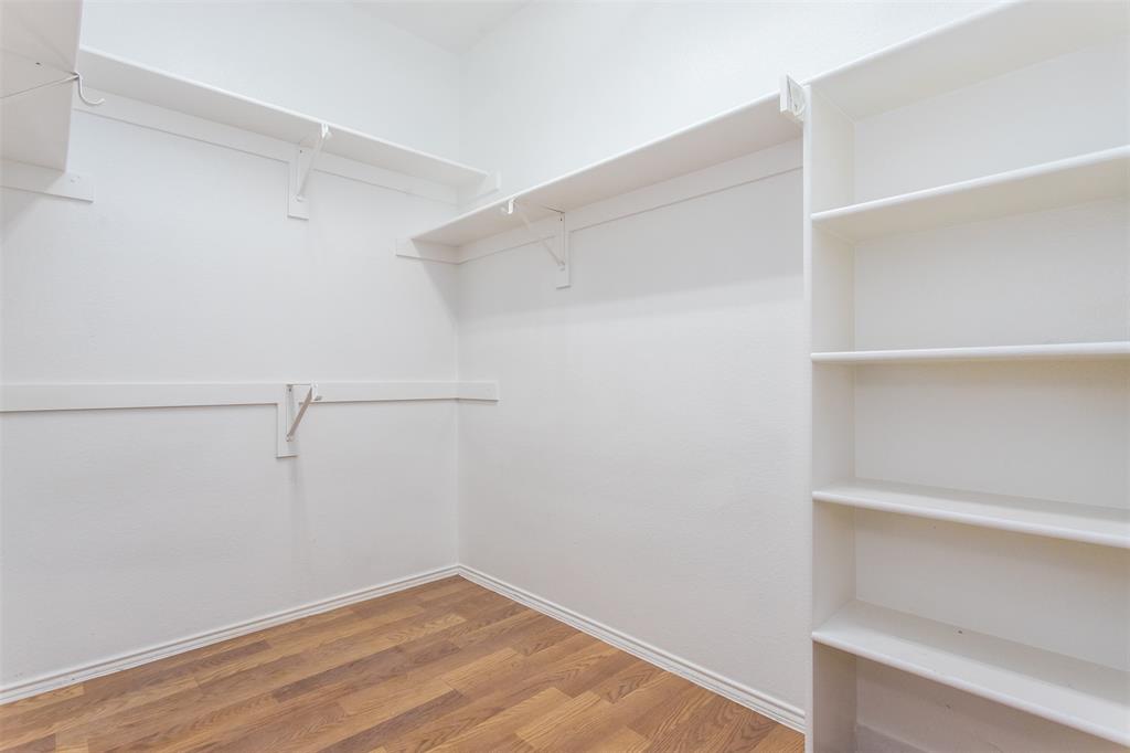 738 Opal Lane Mesquite, TX 75149 - Photo 22 of 31 Spacious closet featuring wood finished floors