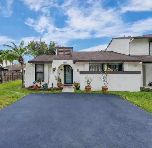 a front view of a house with porch