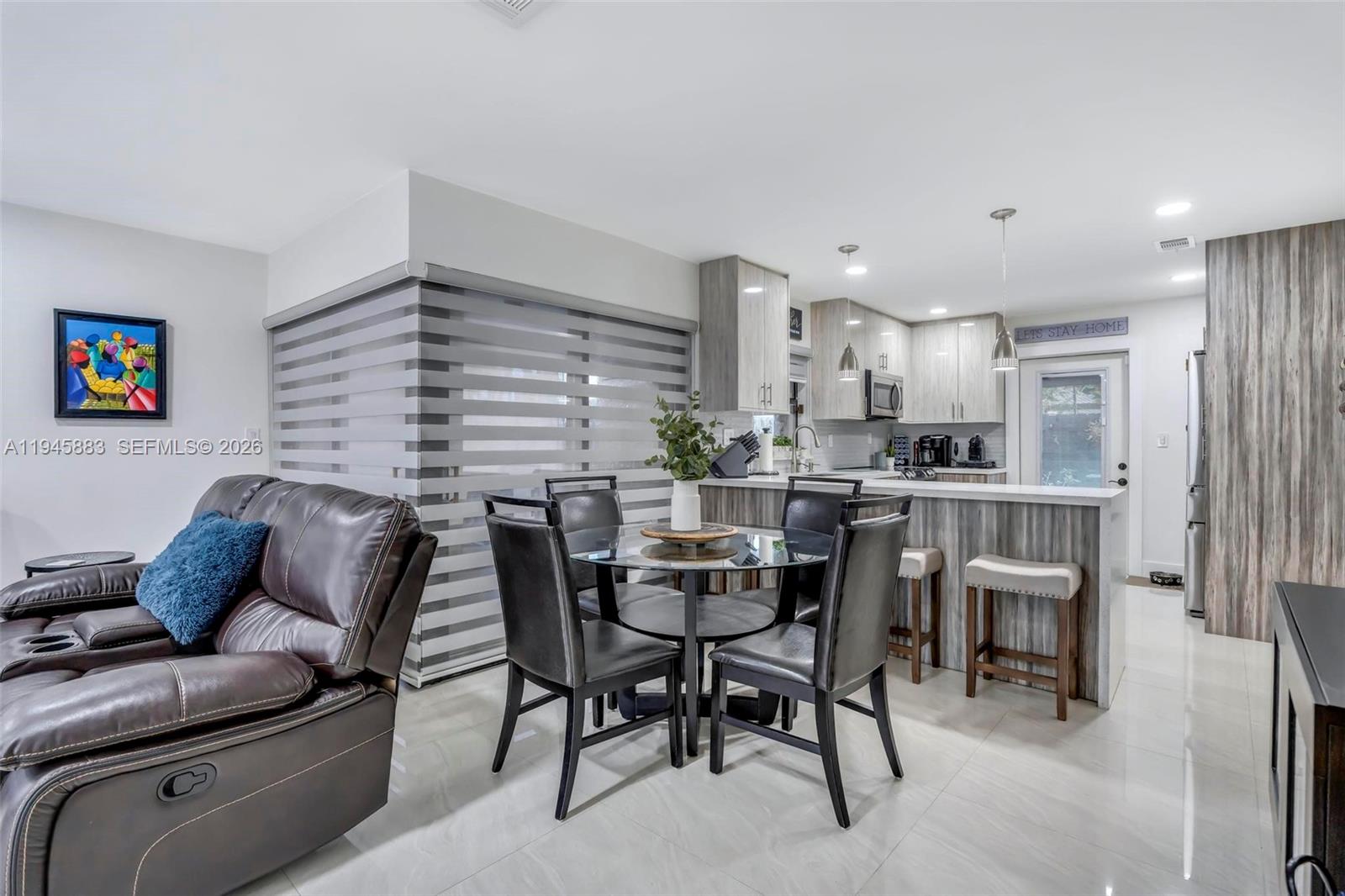 12736 Southwest 68th Lane Miami, FL 33183 - Photo 13 of 37 a dining room with furniture and window