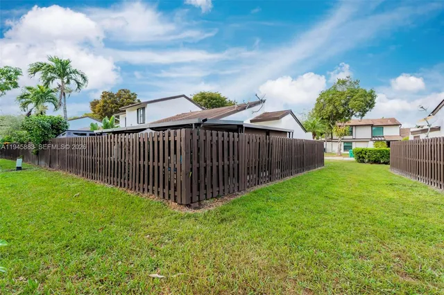 a view of a backyard with a garden
