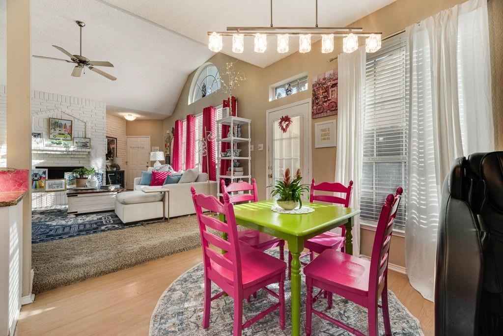 3205 Cape Cod Court Arlington, TX 76017 - Photo 10 of 30 a view of a dining room with furniture and a chandelier