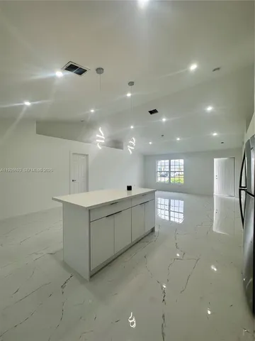 a bathroom with a sink a toilet and a bathtub