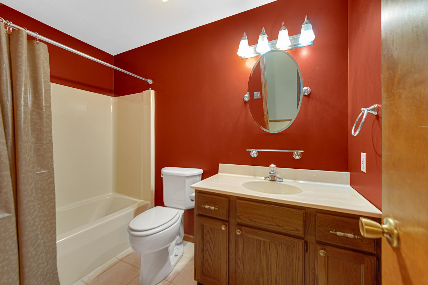 700 Meadow Lane Crown Point, IN 46307 - Photo 15 of 28 a bathroom with a sink mirror vanity and toilet