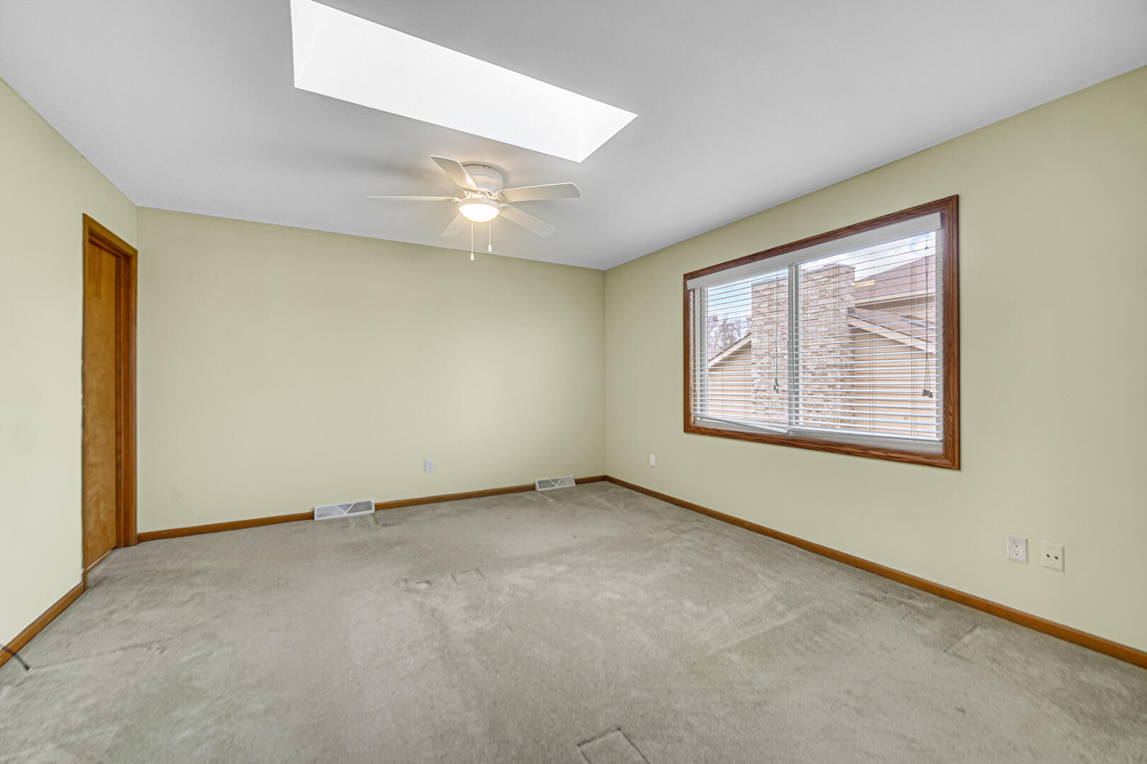 700 Meadow Lane Crown Point, IN 46307 - Photo 16 of 28 an empty room with windows