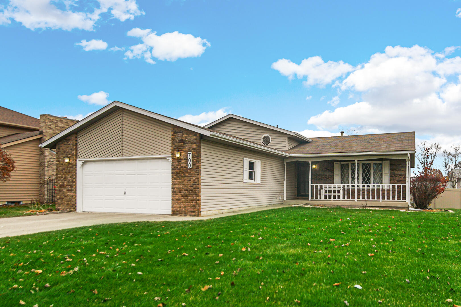 700 Meadow Lane Crown Point, IN 46307 - Photo 3 of 28 a view of a house with yard and a garden