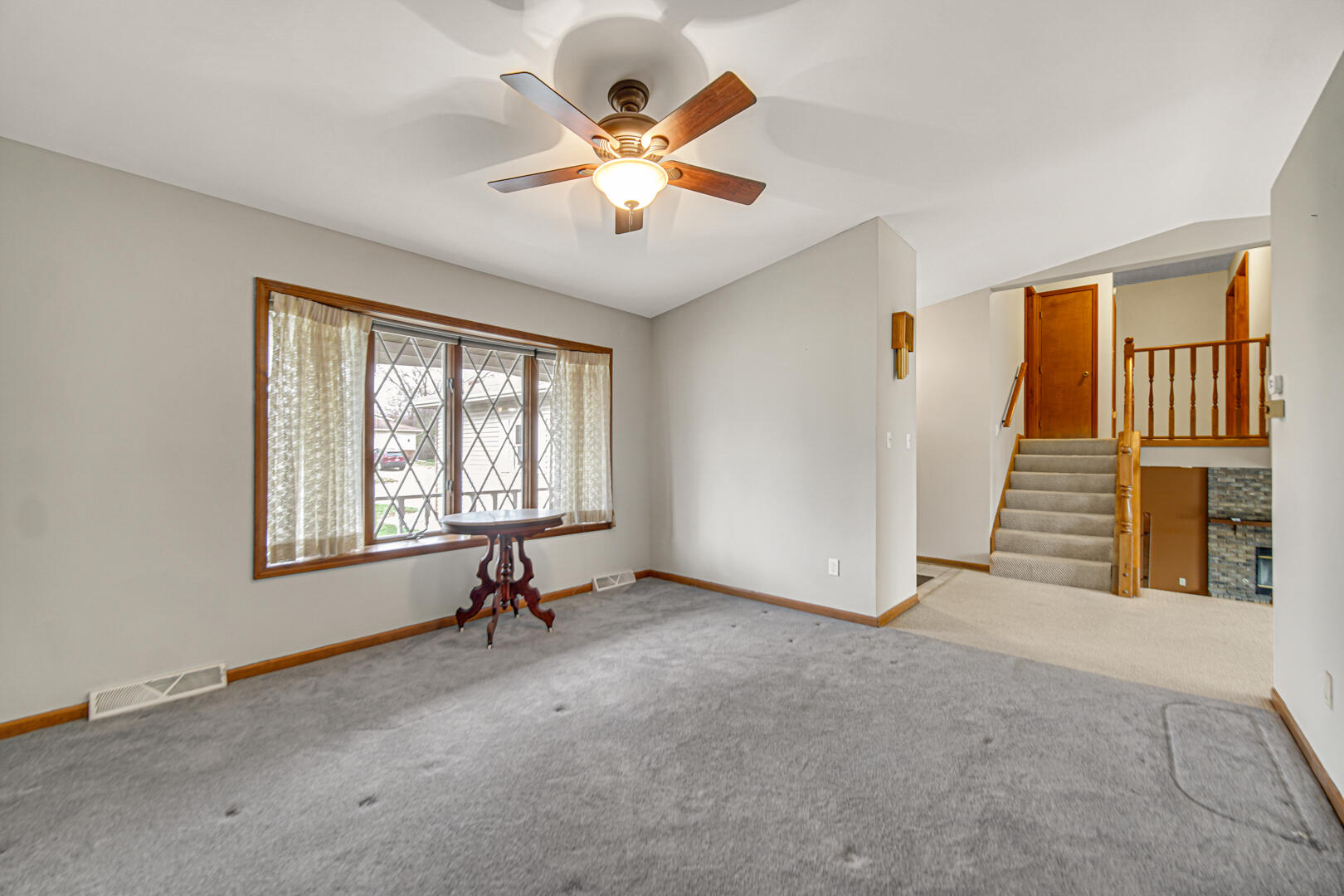 700 Meadow Lane Crown Point, IN 46307 - Photo 6 of 28 a view of an empty room with a window