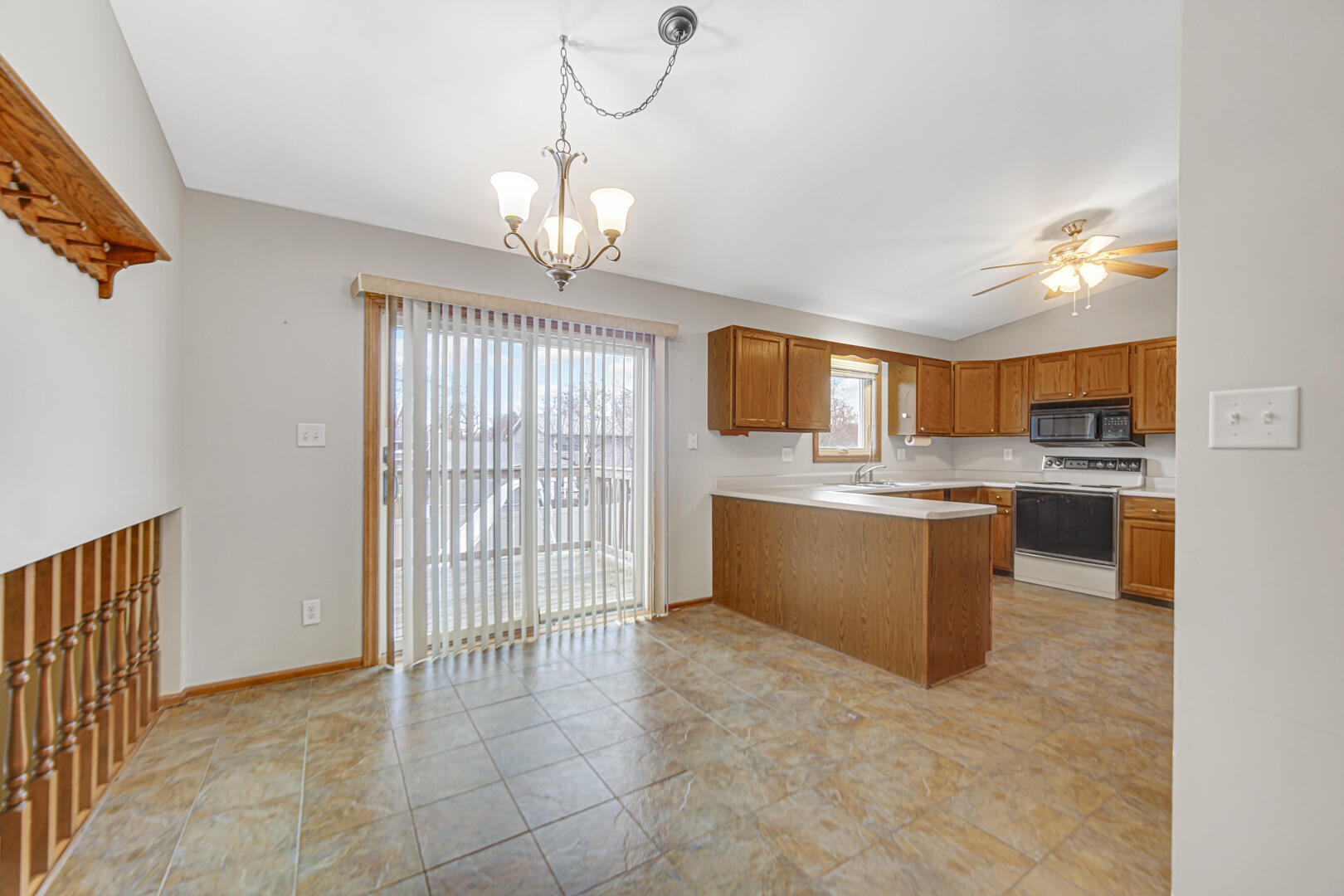 700 Meadow Lane Crown Point, IN 46307 - Photo 8 of 28 a view of a kitchen with a sink and dishwasher a refrigerator with wooden floor