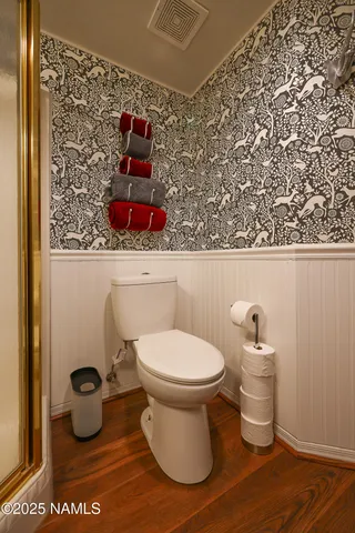 a view of a dining room with furniture and window