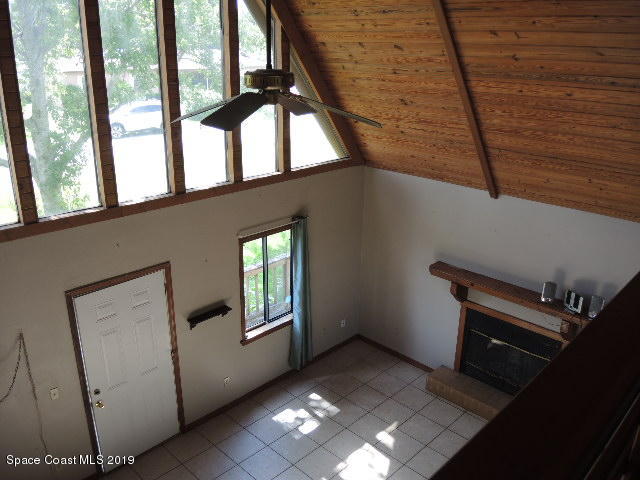 6990 Boston Road Cocoa, FL 32927 - Photo 15 of 26 a view of an empty room with windows