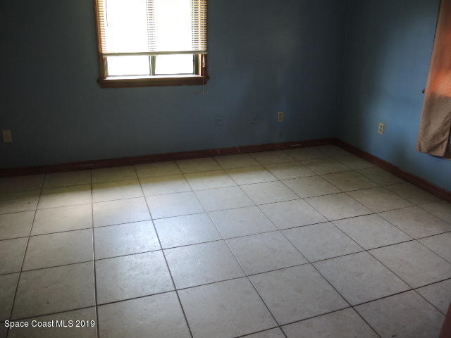 6990 Boston Road Cocoa, FL 32927 - Photo 21 of 26 a view of a room and window