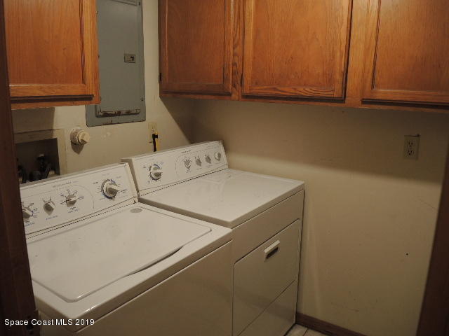 6990 Boston Road Cocoa, FL 32927 - Photo 23 of 26 a utility room with dryer and washer