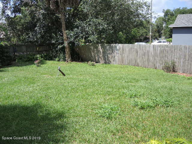 6990 Boston Road Cocoa, FL 32927 - Photo 25 of 26 a view of a backyard