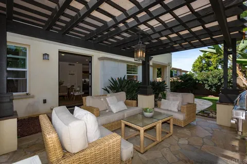 a view of yard with patio