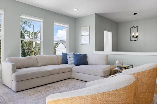 a kitchen with a table and chairs