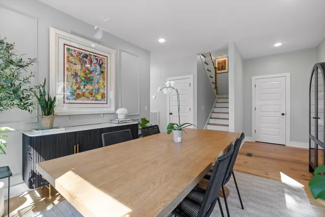 a bathroom with a sink vanity and mirror
