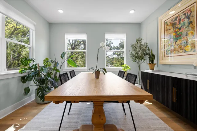 a bathroom with a sink vanity and mirror