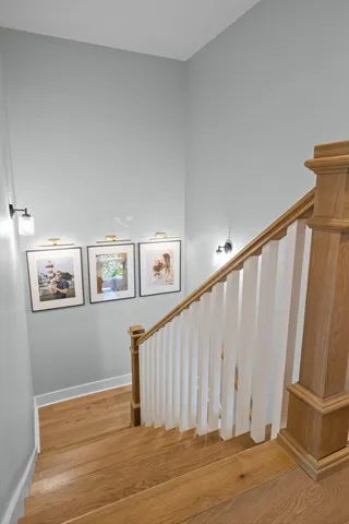 a spacious bathroom with a double vanity sink and a mirror