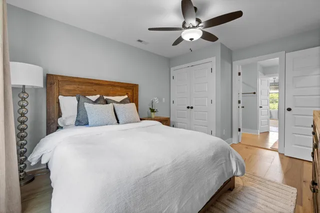 a view of a house with a yard and furniture