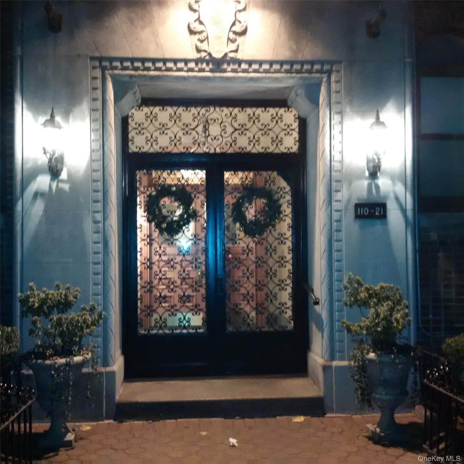 110-21 73rd Road, Unit 5H Queens, NY 11375 - Photo 14 of 14 a view of a entryway door of the house and living room
