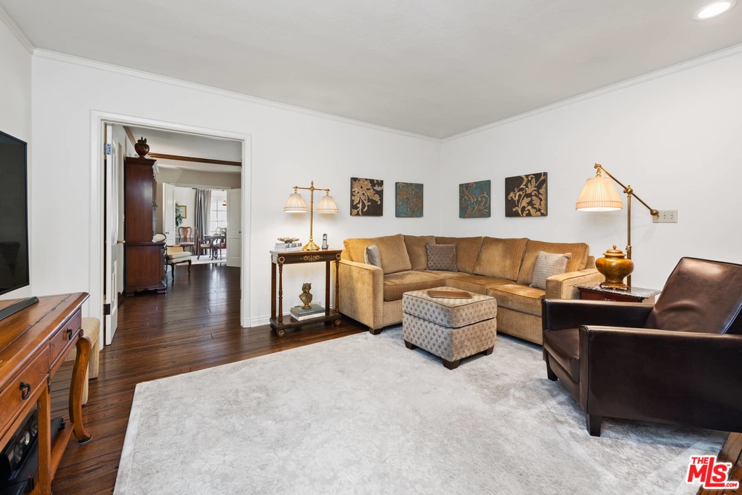 1020 Casiano Road Los Angeles, CA 90049 - Photo 10 of 31 a living room with furniture and wooden floor