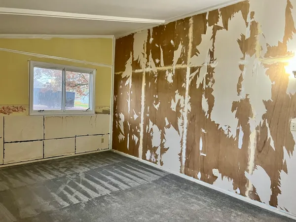 a kitchen with a sink and a refrigerator