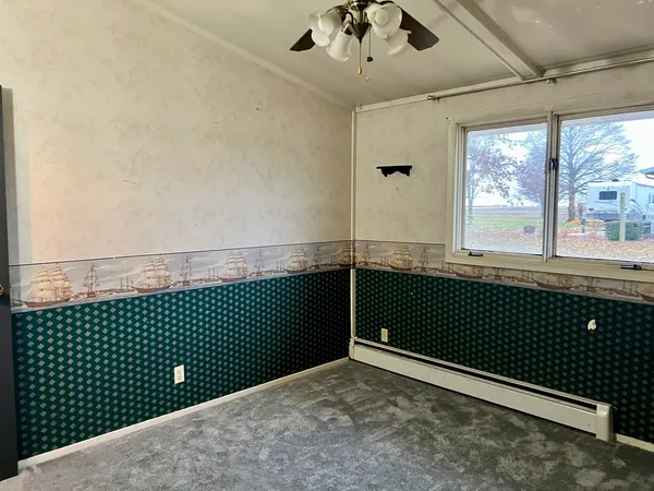 a bathroom with a sink toilet and vanity