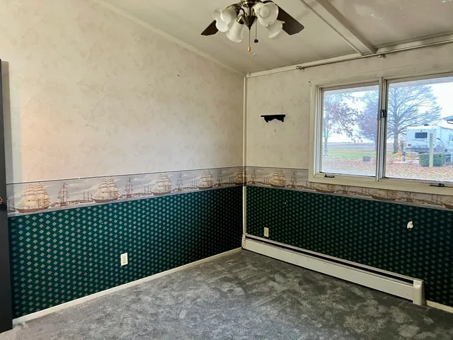 a bathroom with a sink toilet and vanity