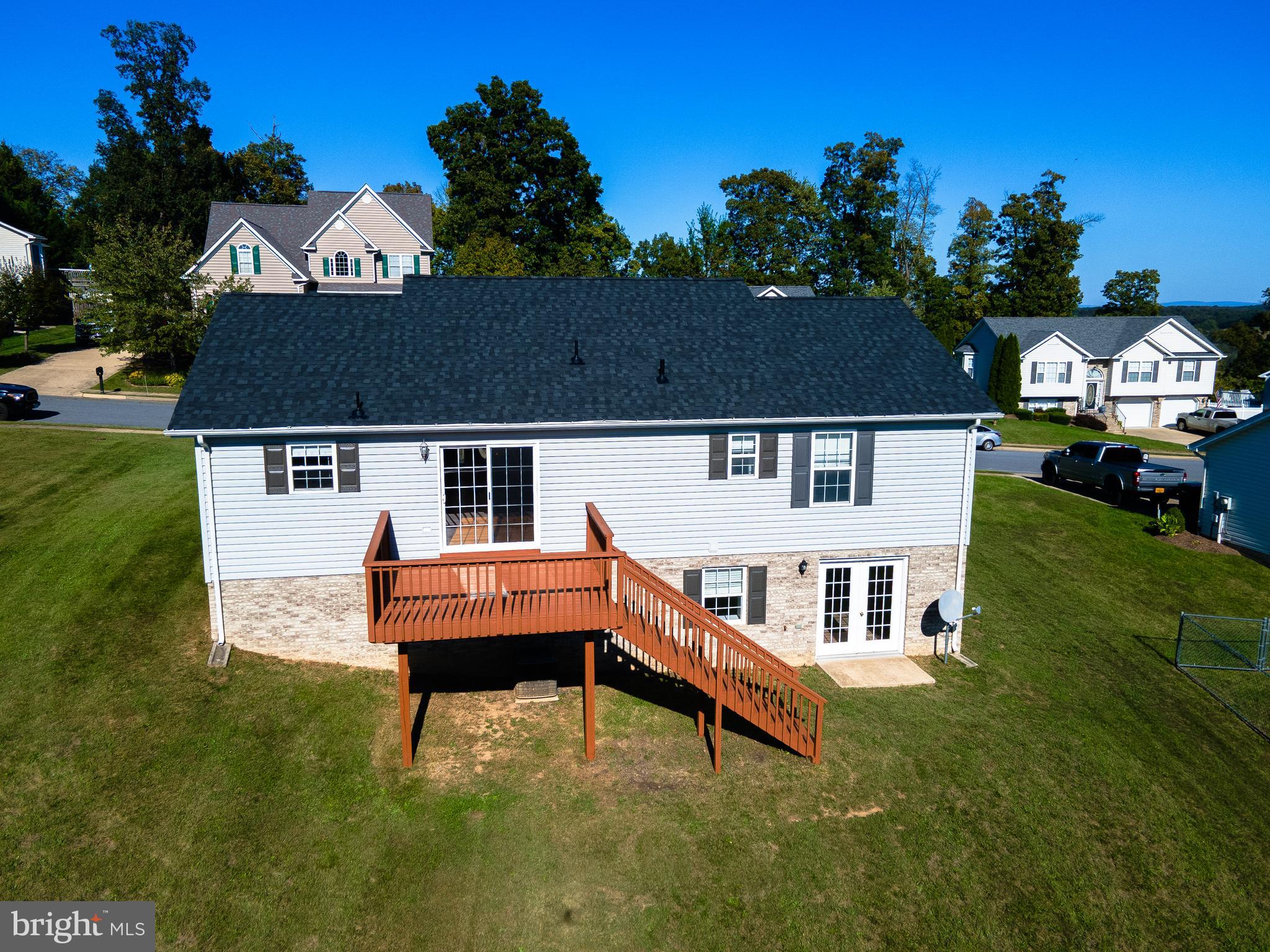 34 Stuart Court Strasburg, VA 22657 - Photo 14 of 54 a aerial view of a house with swimming pool and deck