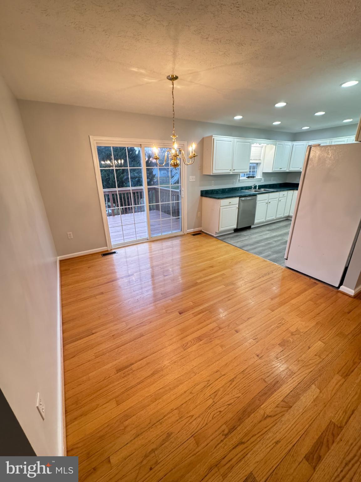 34 Stuart Court Strasburg, VA 22657 - Photo 21 of 54 an empty room with wooden floor and windows