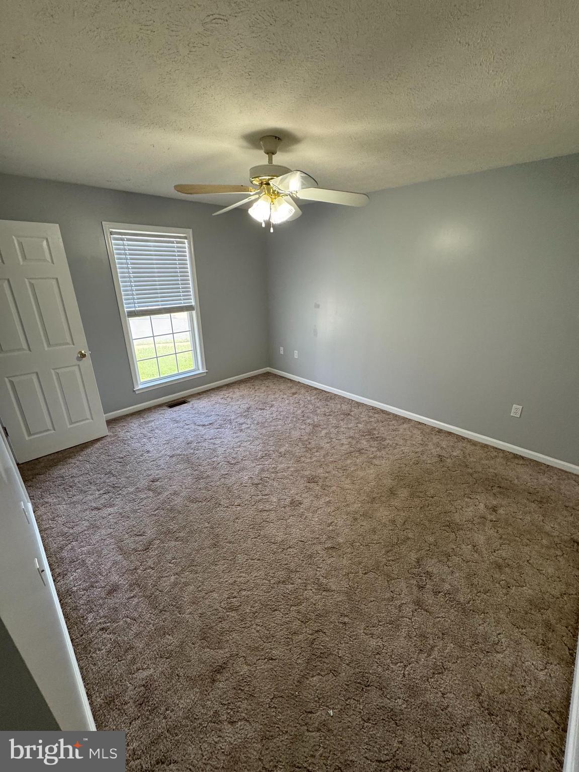 34 Stuart Court Strasburg, VA 22657 - Photo 31 of 54 an empty room with windows and fan
