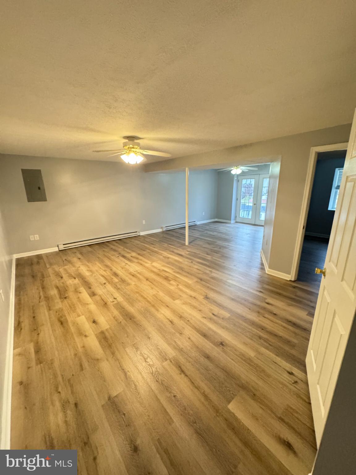 34 Stuart Court Strasburg, VA 22657 - Photo 44 of 54 a view of empty room with wooden floor