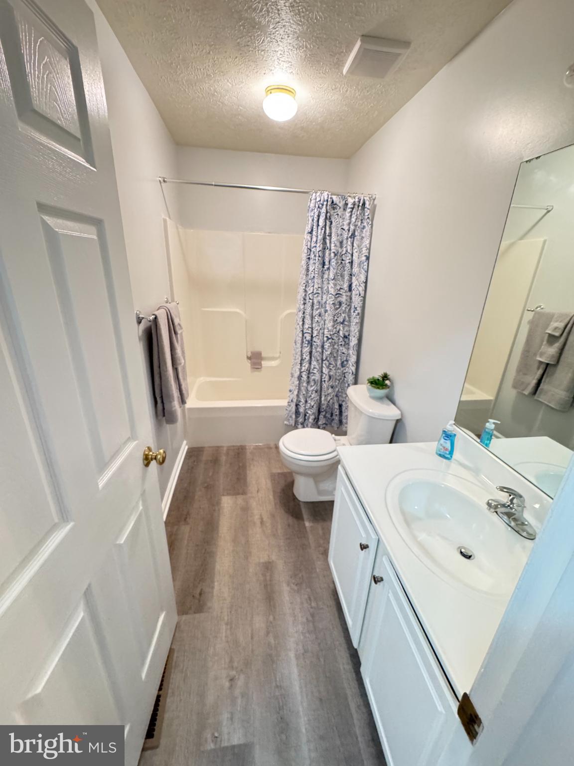 34 Stuart Court Strasburg, VA 22657 - Photo 46 of 54 a bathroom with a double vanity sink toilet and shower