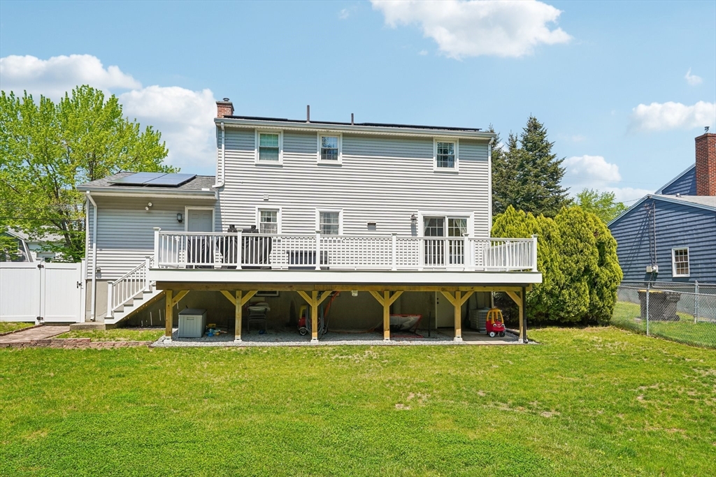 35 Westgate Road Framingham, MA 01701 - Photo 35 of 37 a view of a house with a backyard