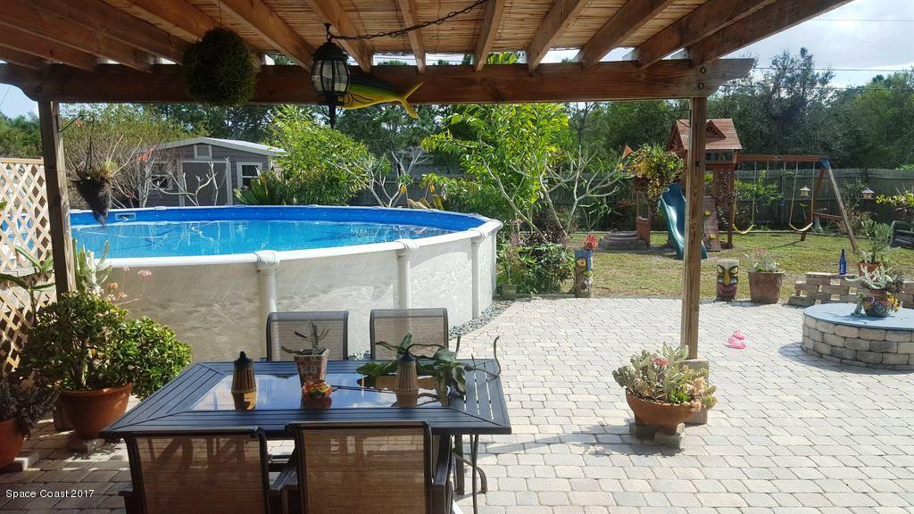 1667 Adview Road Southeast, Unit 50 Palm Bay, FL 32909 - Photo 14 of 26 Pool and Back Yard