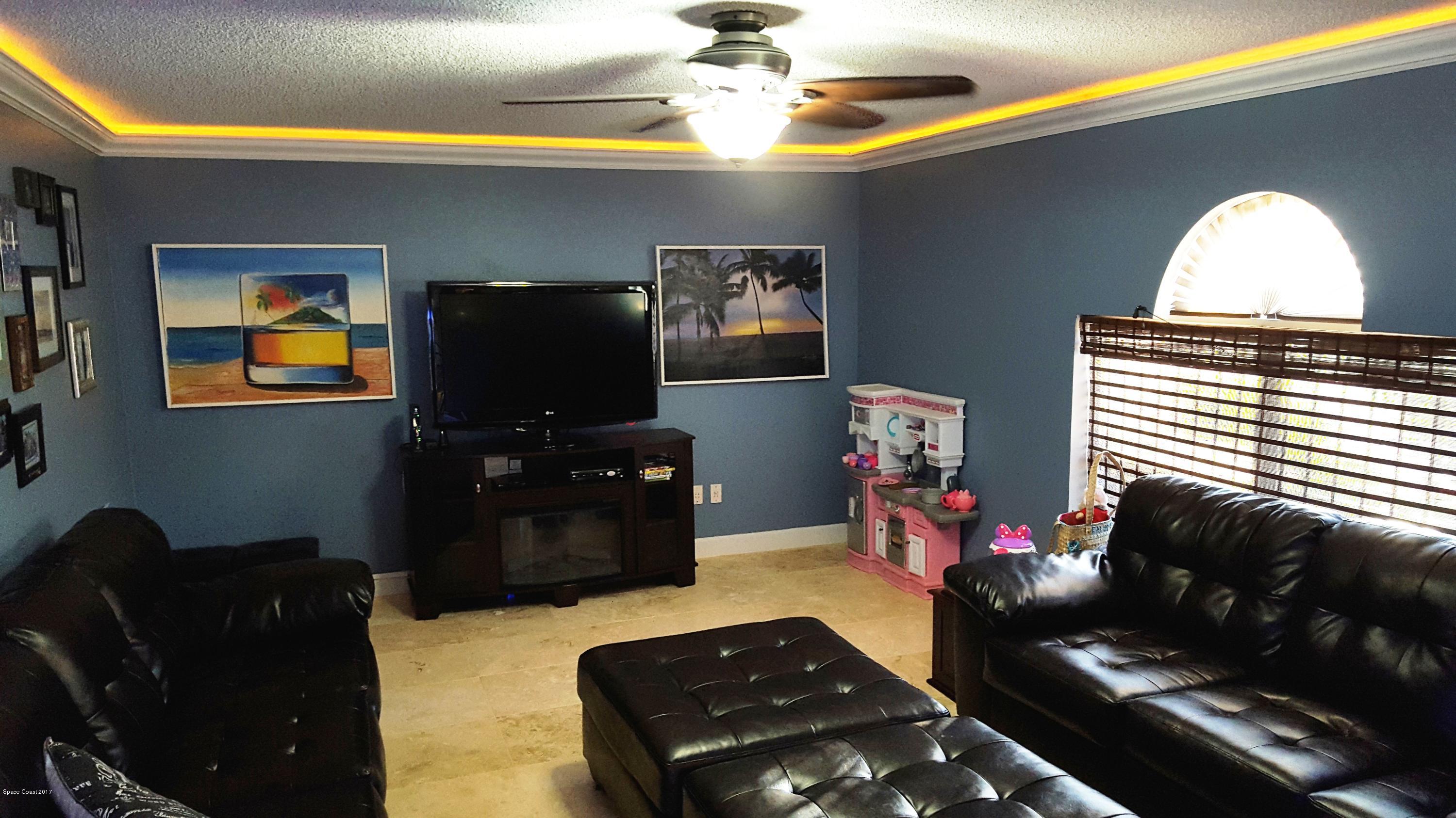 1667 Adview Road Southeast, Unit 50 Palm Bay, FL 32909 - Photo 7 of 26 Family Room from kitchen