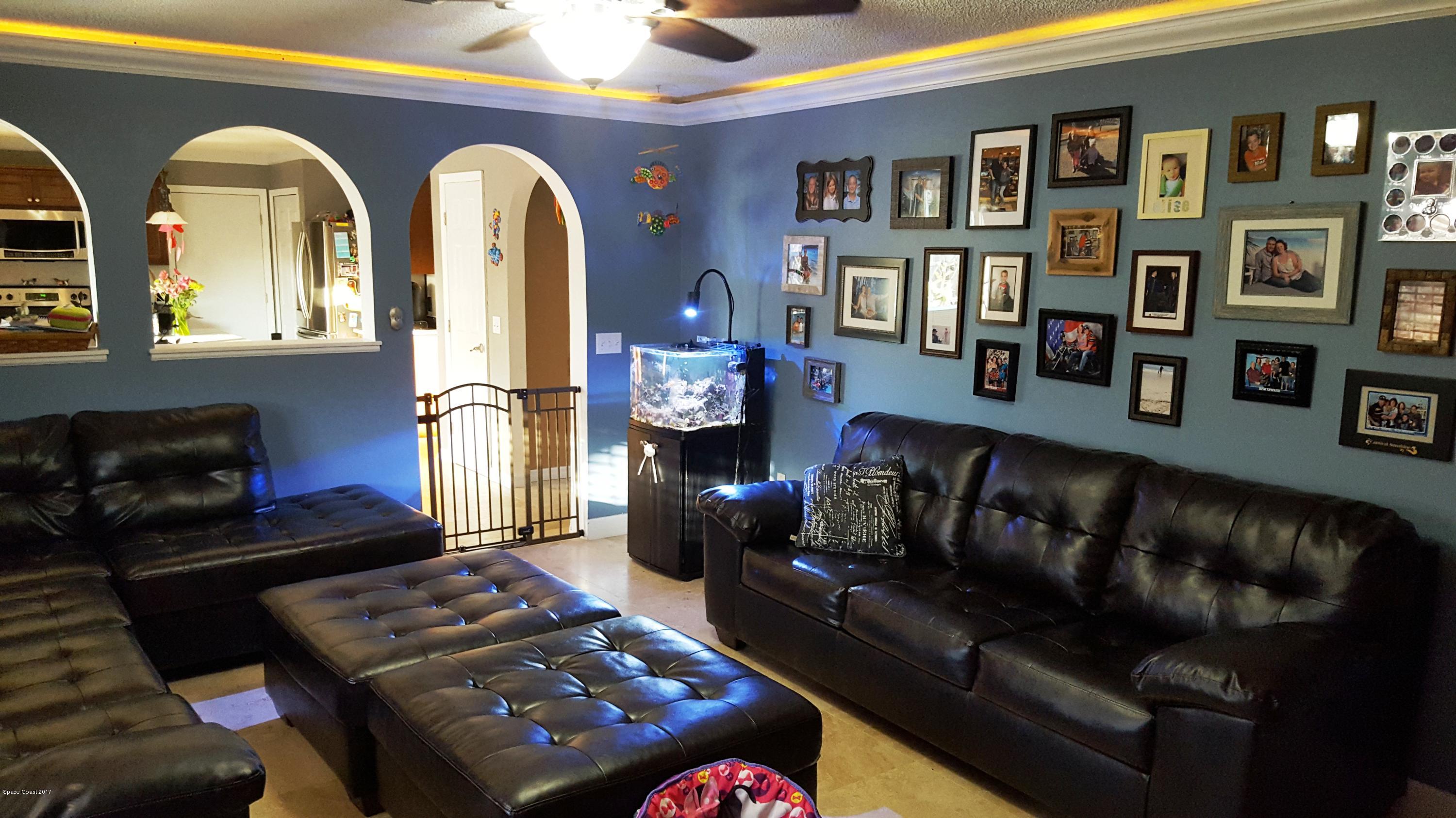 1667 Adview Road Southeast, Unit 50 Palm Bay, FL 32909 - Photo 8 of 26 Family Room towards Kitchen
