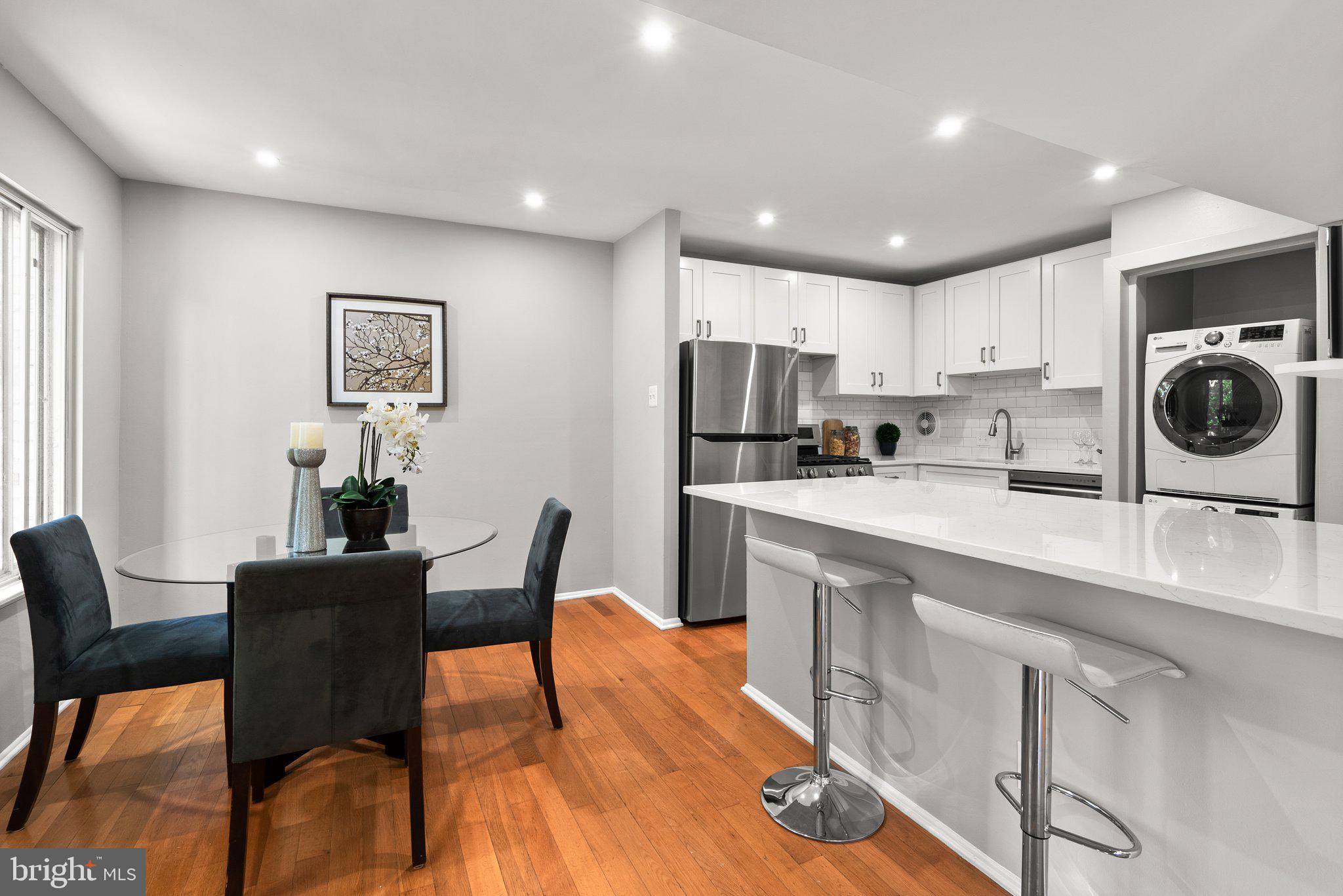 5075 7th Road South, Unit 202 Arlington, VA 22204 - Photo 8 of 23 Dining room with wood floors and recessed lighting