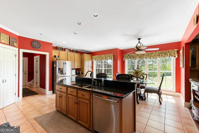 a view of a living room and kitchen